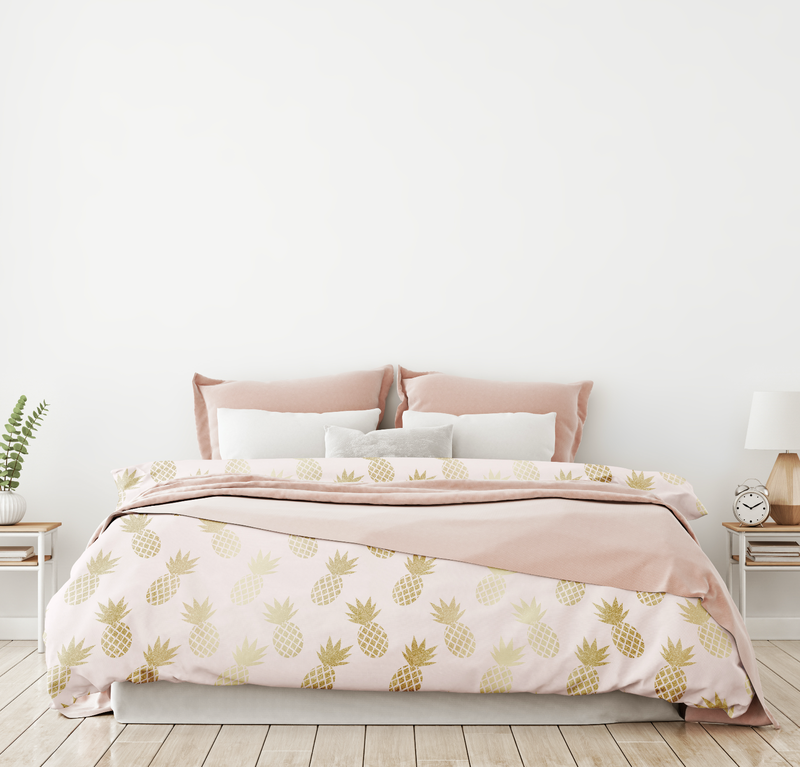 Pink and Gold Pineapple Pattern Comforter from Society6