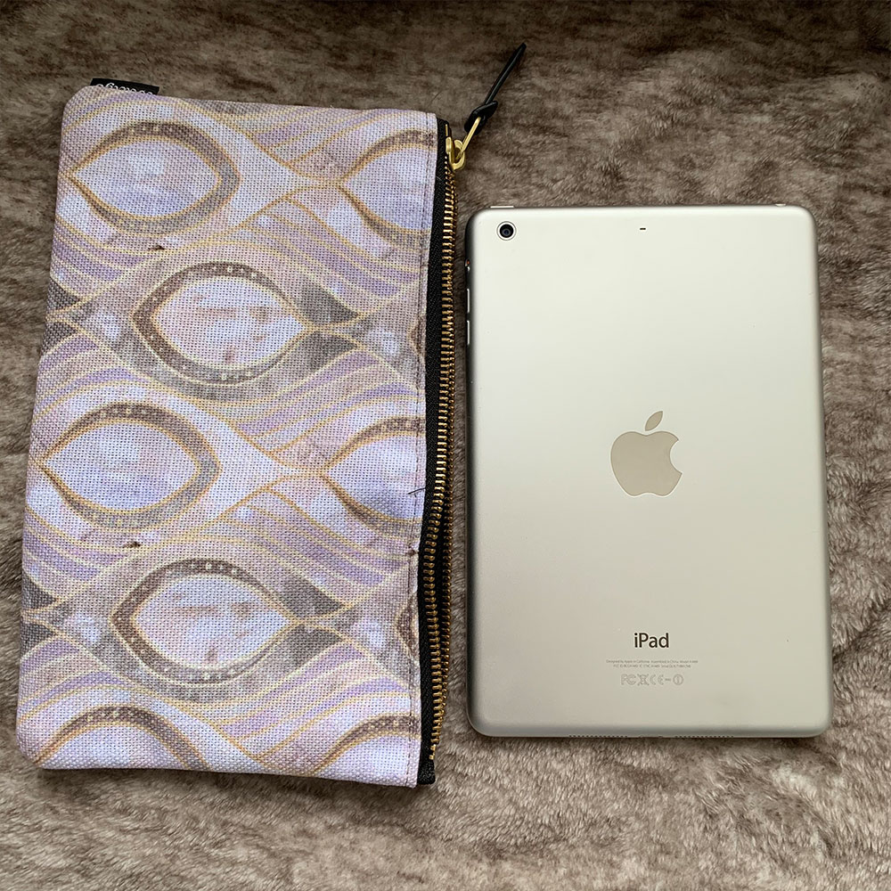 iPad mini size comparison with the Society6 Carry All Pouch in Medium